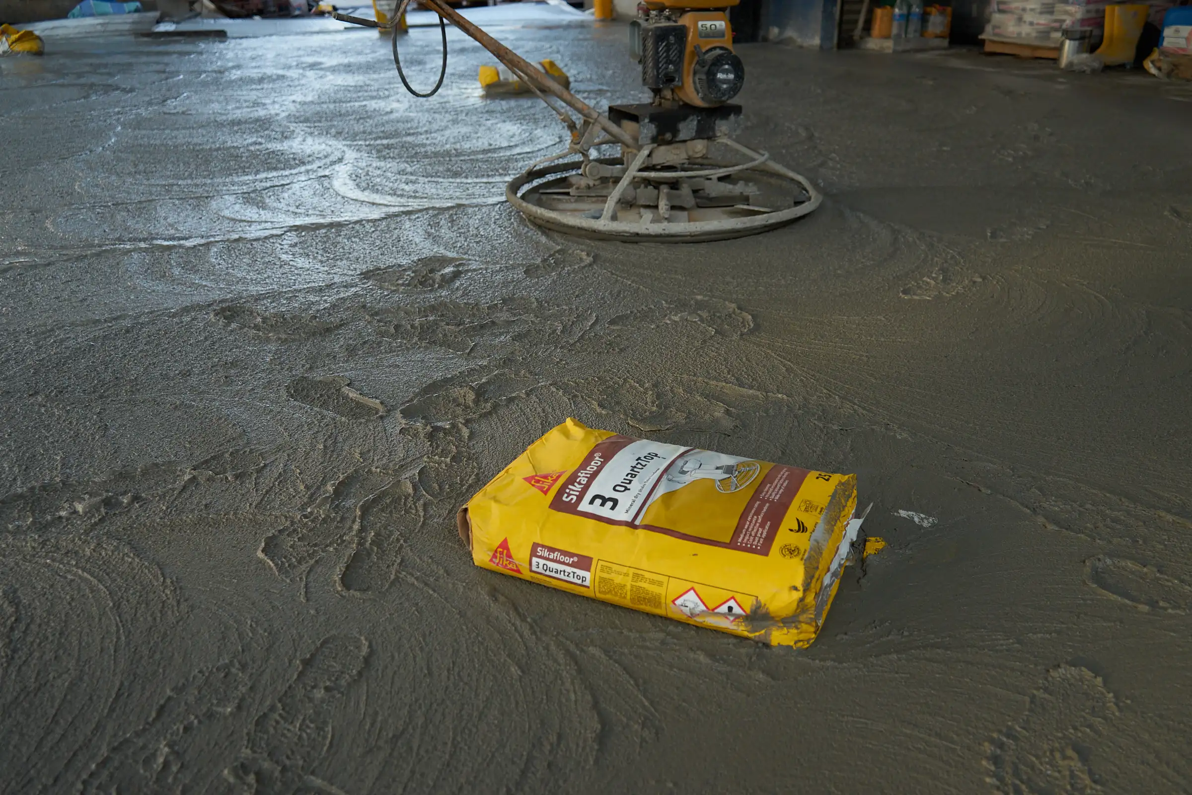 Floor preparation work using branded construction materials